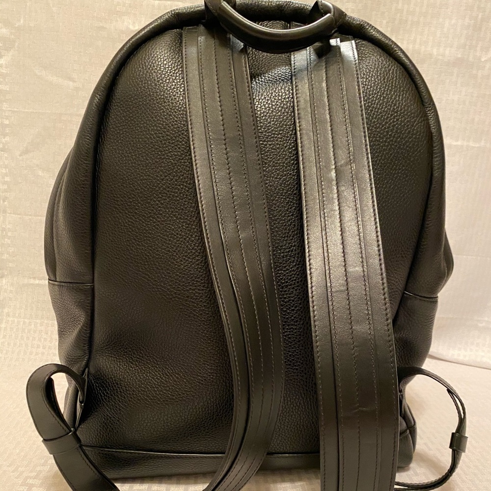 This is an original Tom Ford backpack leather with gold zippers and hardware